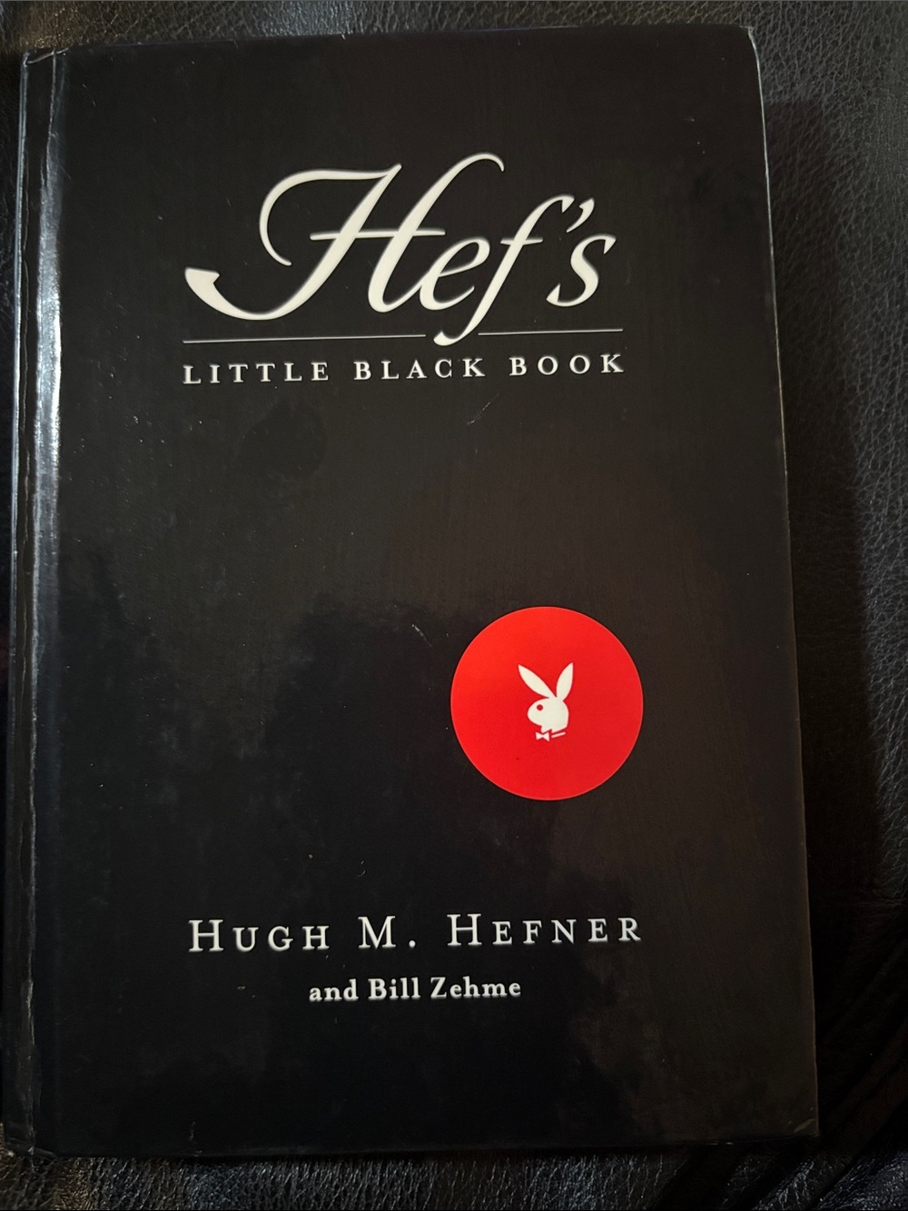 Hef's Little Black Book by Hugh M. Hefner - Black with Red Bunny Logo